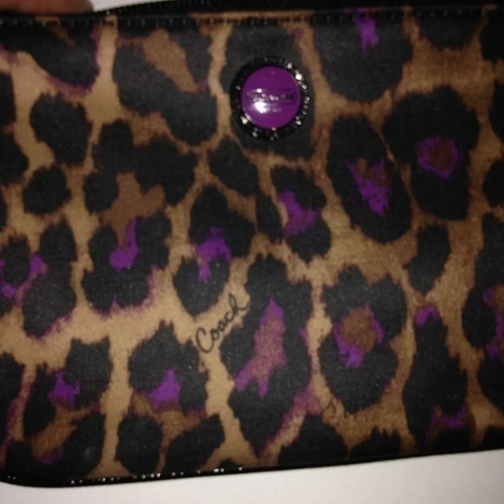 Coach rare ocelot wristlet purple animal print